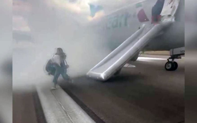 Yolcu uçağında yangın: 179 kişi tahliye edildi